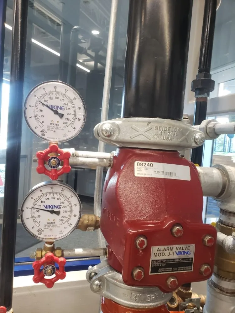 Fire sprinkler alarm valve assembly